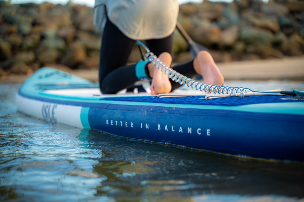 paddle boarder, close up of feet