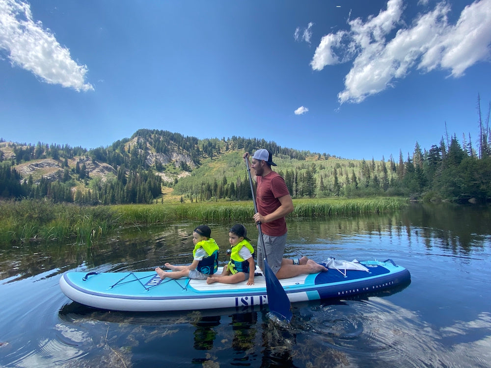 Paddle Boarding With Kids On Calm Water