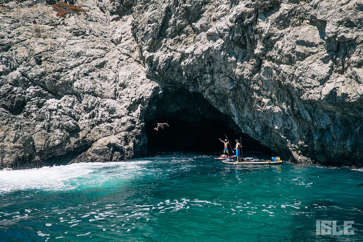 Standup Paddle Boarding On Big Sur Coast Jumping Off Cliffs By Buxby Bridge