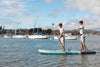 Two Men On The Megalodon Paddle Board
